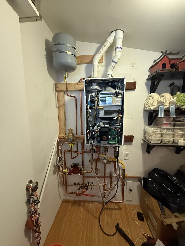 Professionally installed tankless water heater system by 5Star Plumbing & Sewer